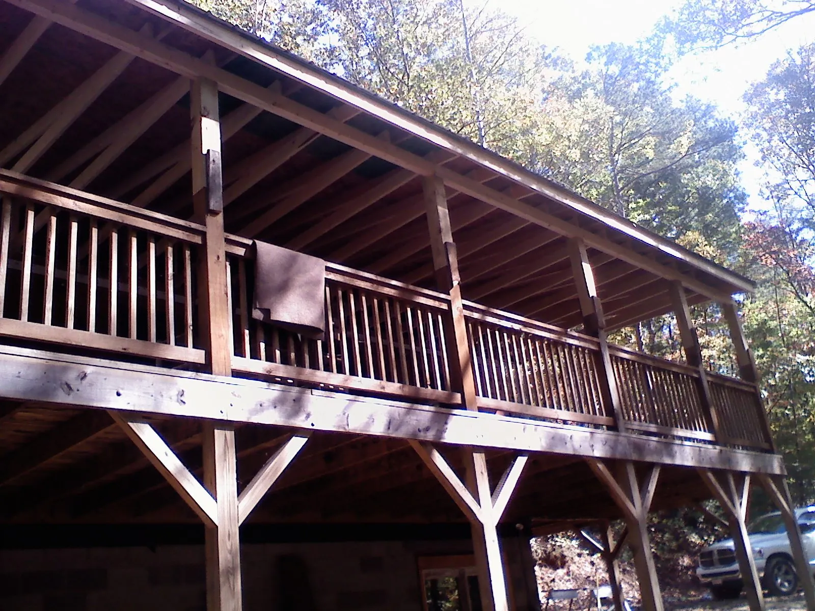 Timber framing under a new elevated porch and deck — Roof Leak Repair in Laurier by Roofing Brothers